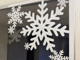 Sneeuwvlok als kerstdecoratie voor deur en raam