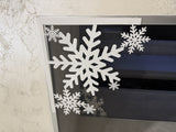 Sneeuwvlok als kerstdecoratie voor deur en raam