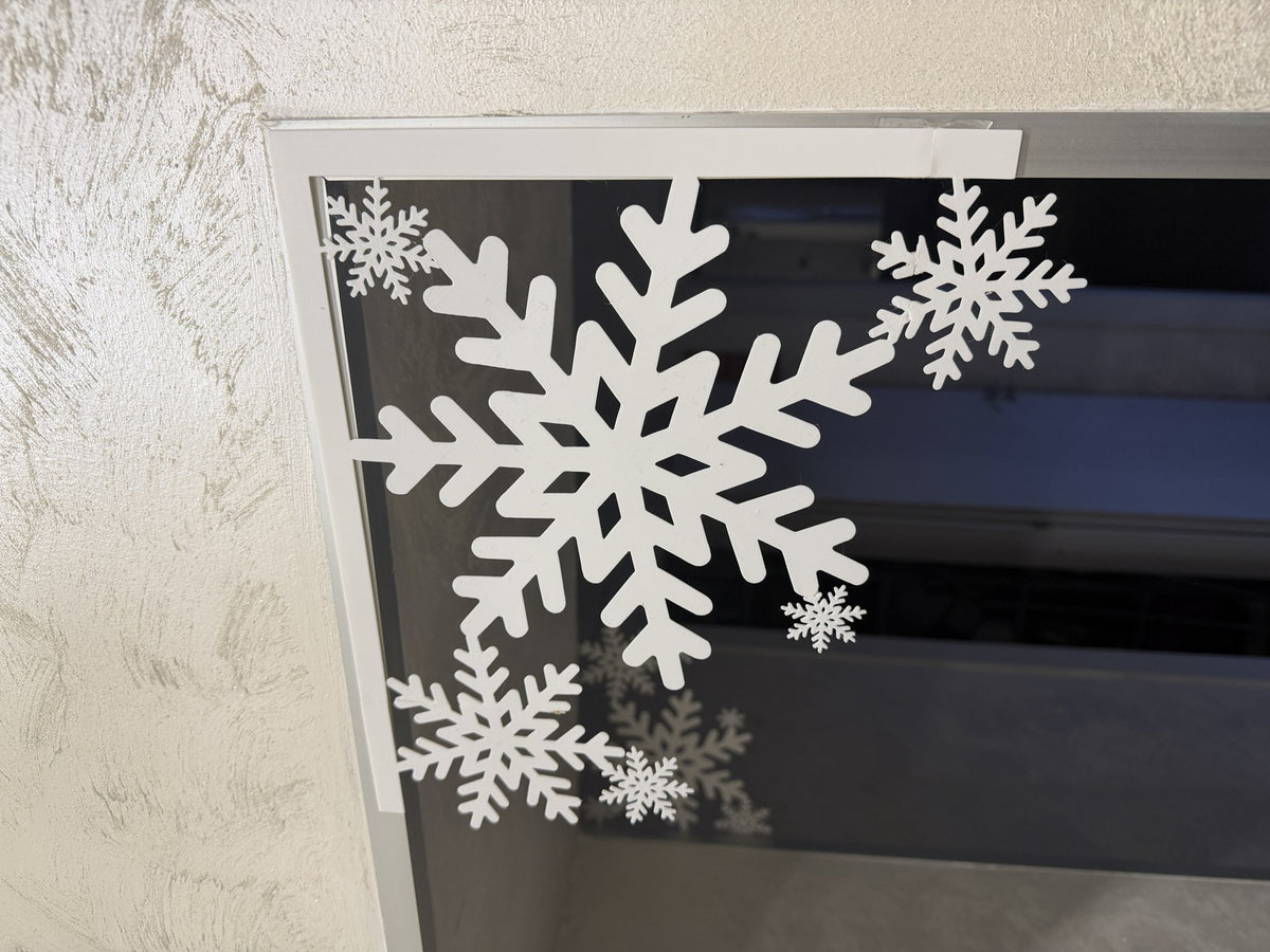 Sneeuwvlok als kerstdecoratie voor deur en raam