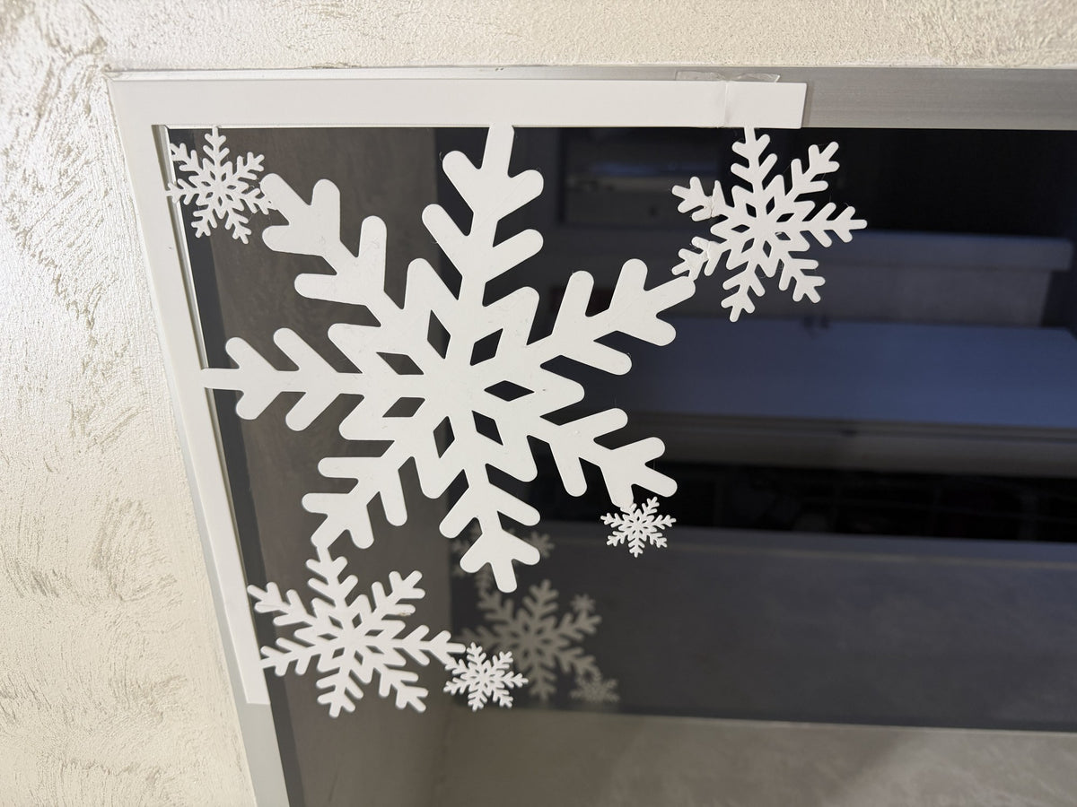Sneeuwvlok als kerstdecoratie voor deur en raam