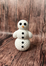 Schattig sneeuwpopfiguurtje in gebreide look