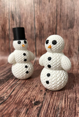 Schattig sneeuwpopfiguurtje in gebreide look
