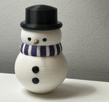 Sneeuwpopfiguurtje met sjaal en hoge hoed