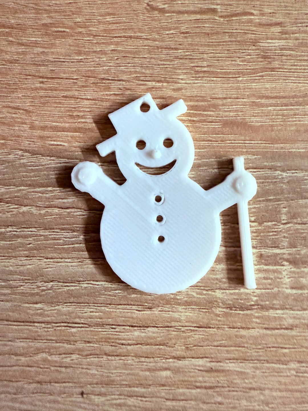 Minimalistische sneeuwpop als kerstboomversiering