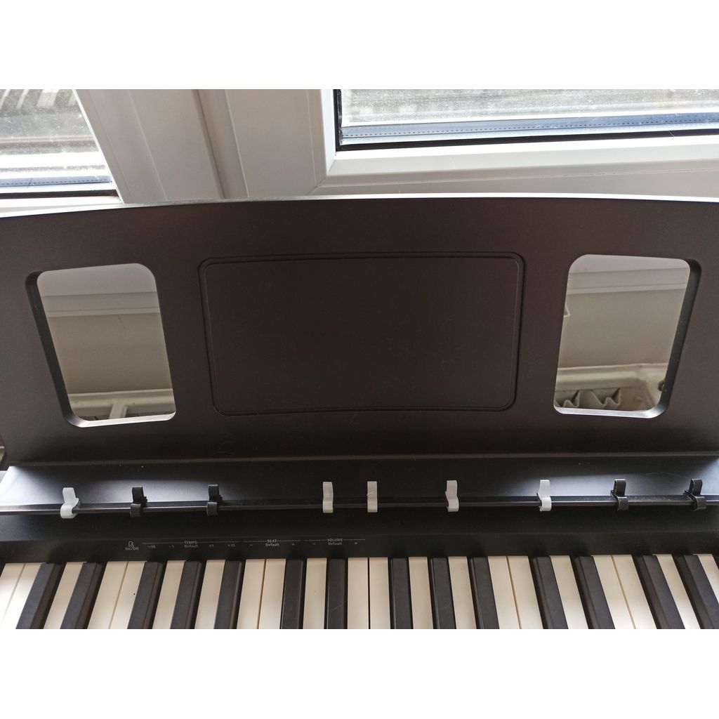 Bladmuziekhouder voor piano – clip die je op de standaard klikt