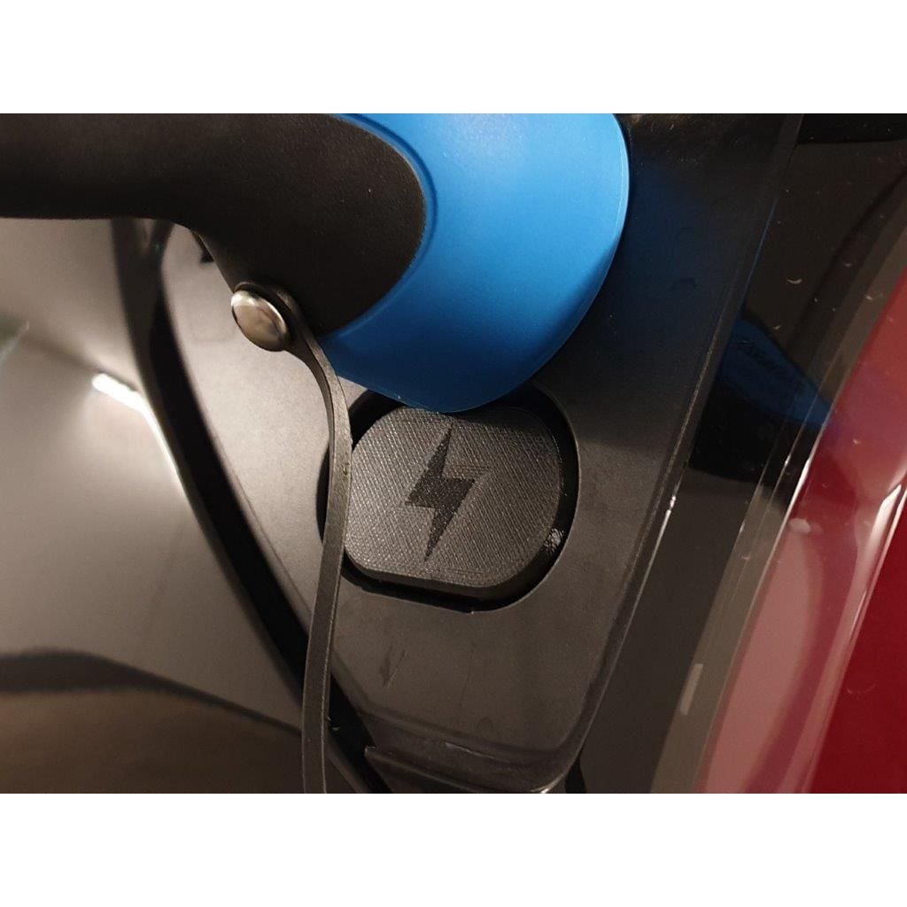 Klepje voor de CCS-laadpoort van de Tesla Model 3