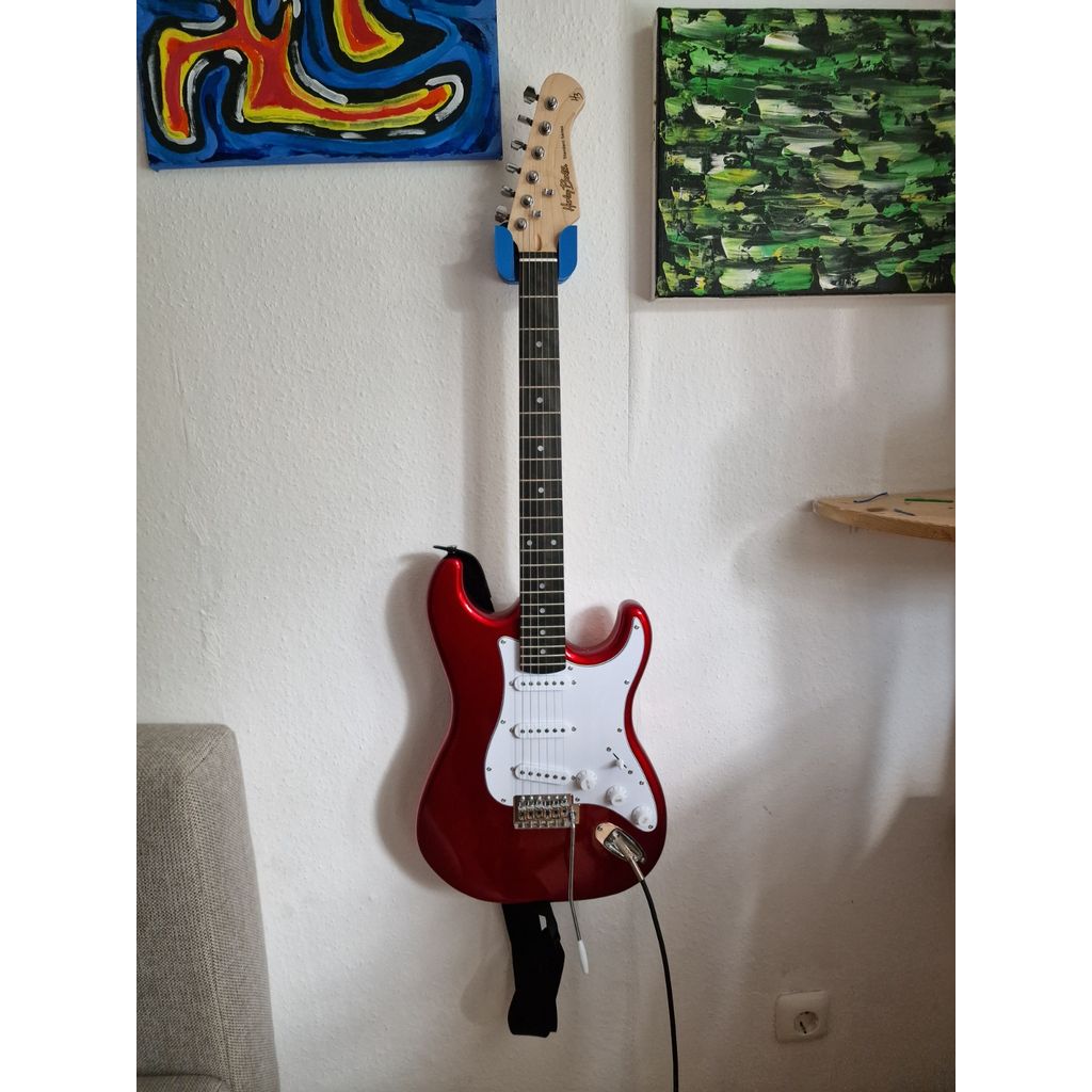 Wandhouder voor gitaar met ruimte voor plectrums