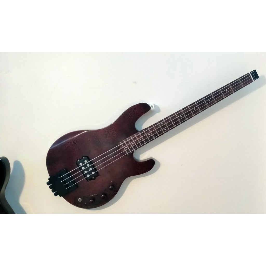 Wandhouder voor gitaar en bas via de bandknop